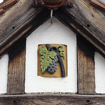 Grapevine motif above door Holt Owl Trail